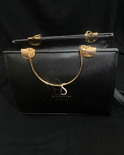 Stylish black Handbag with golden tone